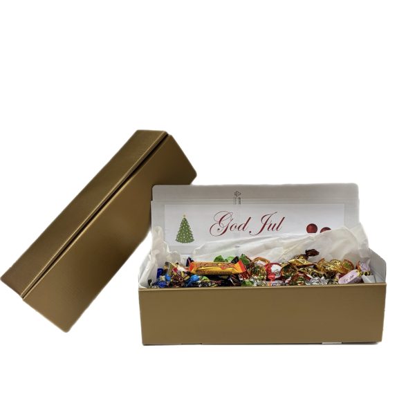 Gouden doos met kerstsnoepjes